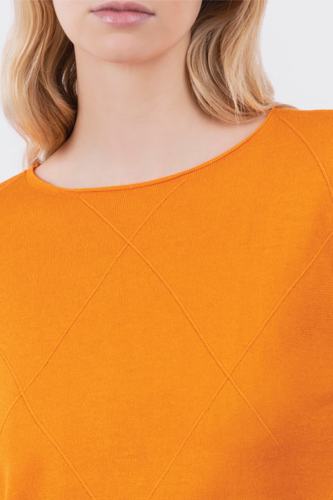 Asymmetric diamond-patterned sweater