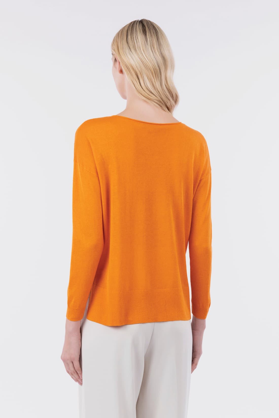 Asymmetric diamond-patterned sweater