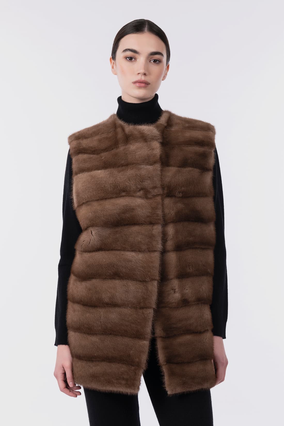 Long gilet with mink fur