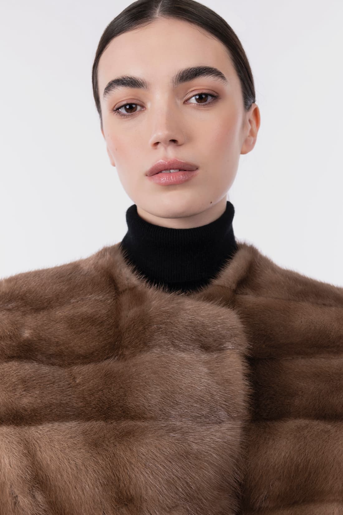 Long gilet with mink fur
